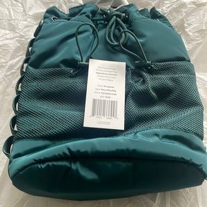 Dagne Dover Nova Sling bag. Color-evergreen limited edition.NWT